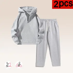 Men’s solid-color two-piece athletic set featuring a casual drop-shoulder half-zip hooded sweatshirt and drawstring sweatpants with pockets; available in matching couples styles; street style; suitable for outdoor activities in spring and autumn; can be g