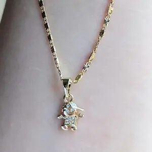 DIJE DE NIÑO (NO INCLUYE CADENA) ORO LAMINADO 14K