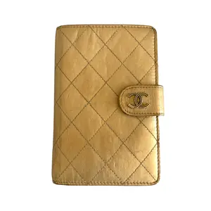 Pre-owned CHANEL Wallet Small Leather Goods gold quilted lambskin leather bifold authentic with COA