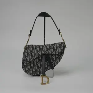 Pre-owned Dior Saddle Bag Classic Monogram Design with Gold Hardware Adjustable Strap for Everyday Use Stylish & Functional Leather Satchel