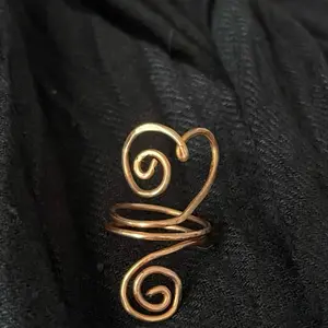 Handcrafted copper heart ring.