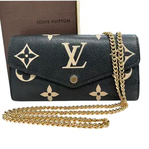Pre-owned Louis Vuitton Leather Crossbody Bags Giant Empreinte Monogram Sarah Wallet with Chain