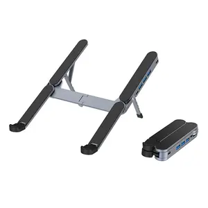 5-in-1 laptop stand with 2 Type-C ports and 3 USB 3.0 ports. A durable, multifunctional laptop support stand that functions as a foldable monitor riser, laptop holder, tablet and computer accessory support, adjustable desktop stand, and monitor stand.