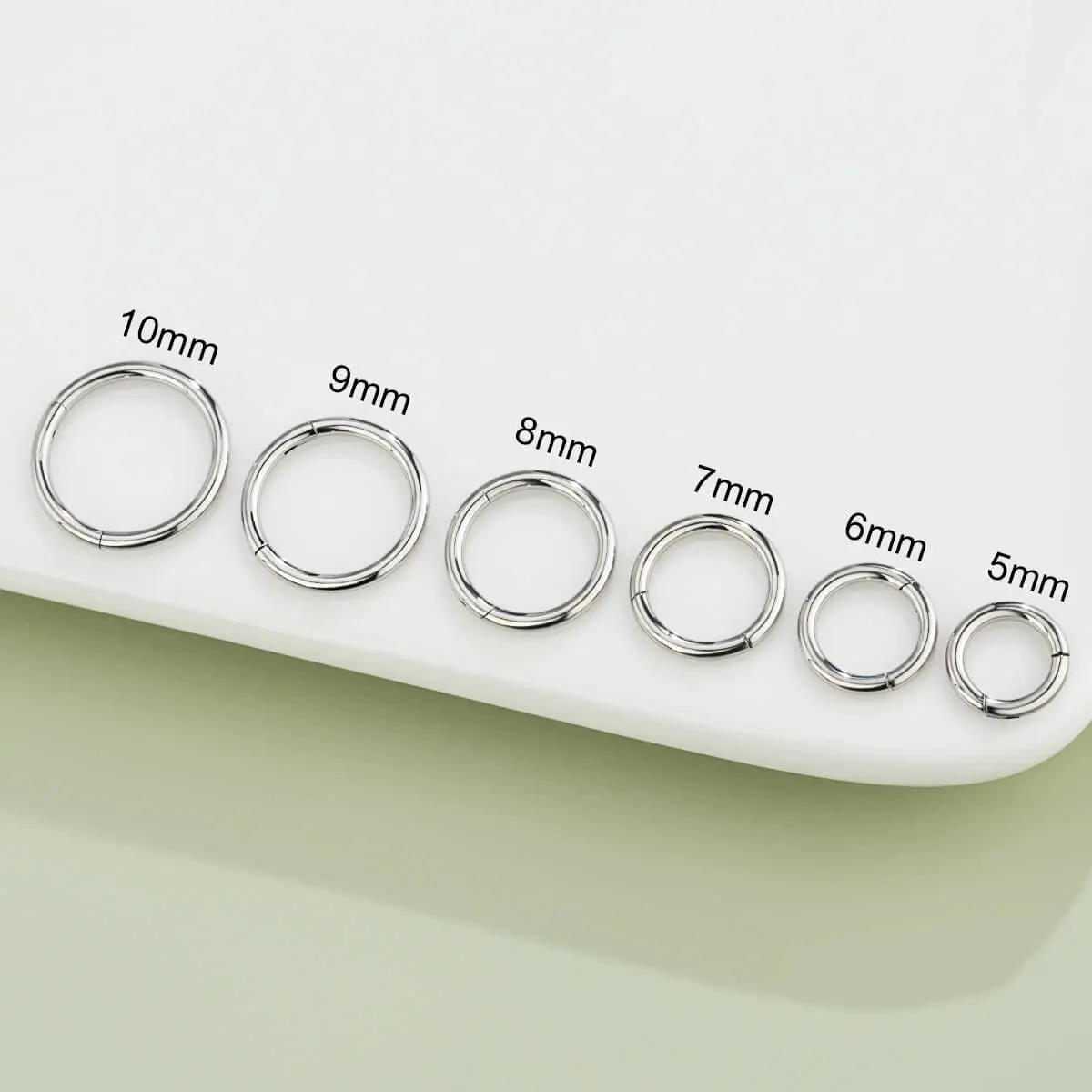 OUFER 20G Hinged Segment Hoop Body Jewelry - 316L Stainless Steel, Non-Tarnish, Rust-Resistant for Female Helix Cartilage, Nose Piercings, Hinged Fit, Secure Fit Feels Gentle for Long Wear (0.8mm)