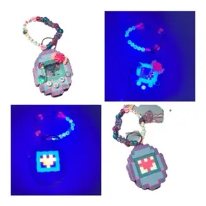 Candy Themed Tamagotchi Keychain Shaker - Glow in the Dark Fidget Toy!
