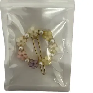 Golden tone hair clips