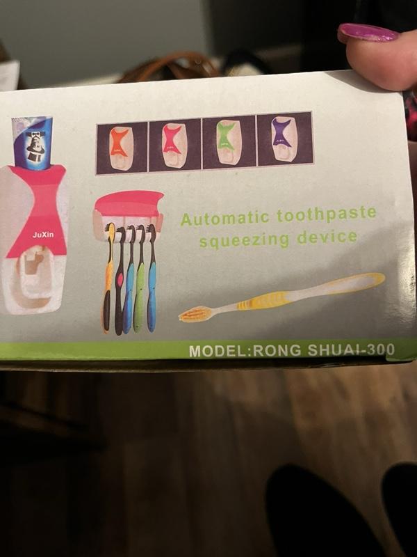 Toothpaste squeezing dispenser and toothbrush holder