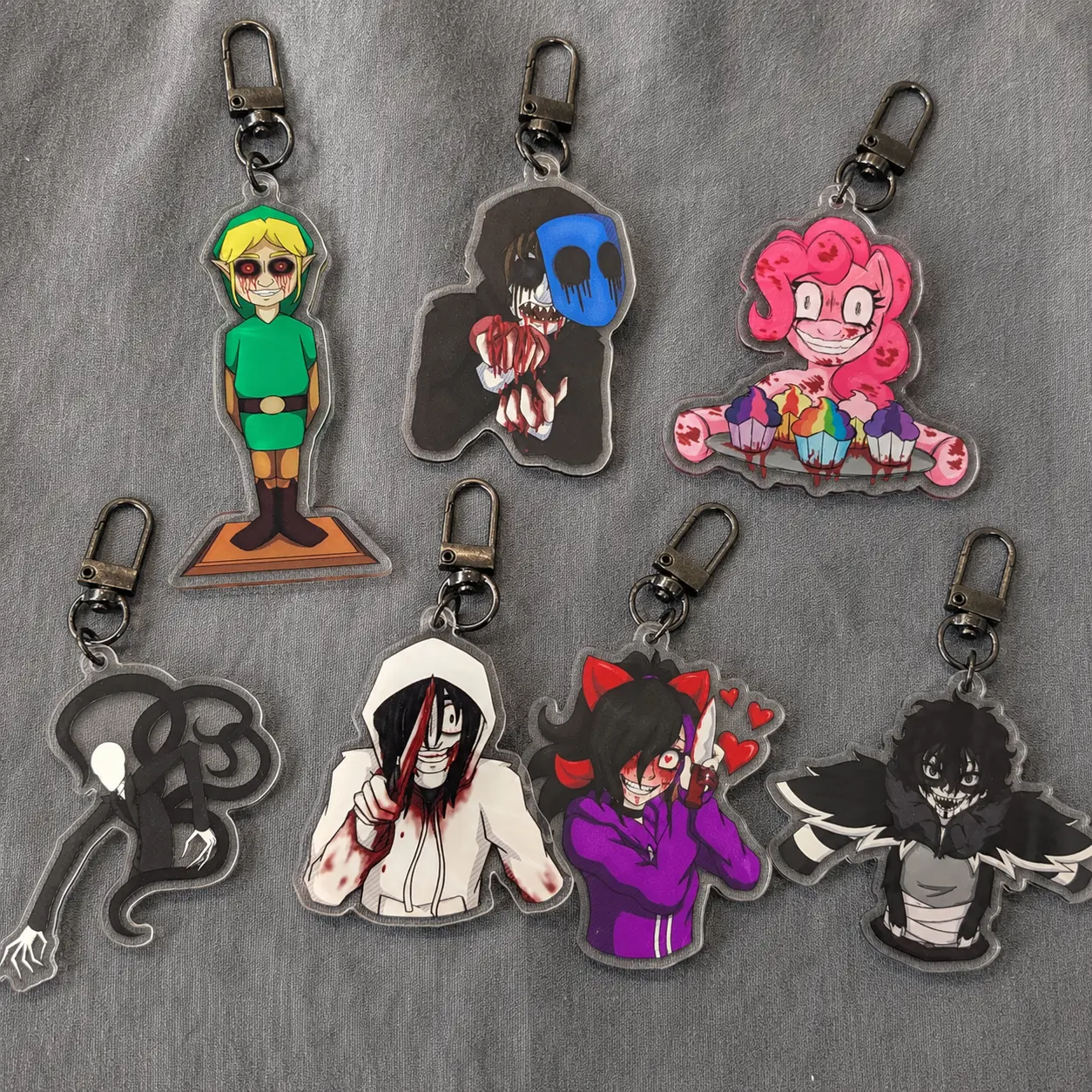 Creepypasta Keychain - Ben Drowned, Eyeless Jack, Cupcakes, Slenderman, Jeff The Killer, Nina The Killer, Laughing Jack - Cute, Durable, And Perfect For Bags, Keys, Or Gifts. Great For Daily Use Or As Thoughtful Little Gifts For Your Friends And Yourself.