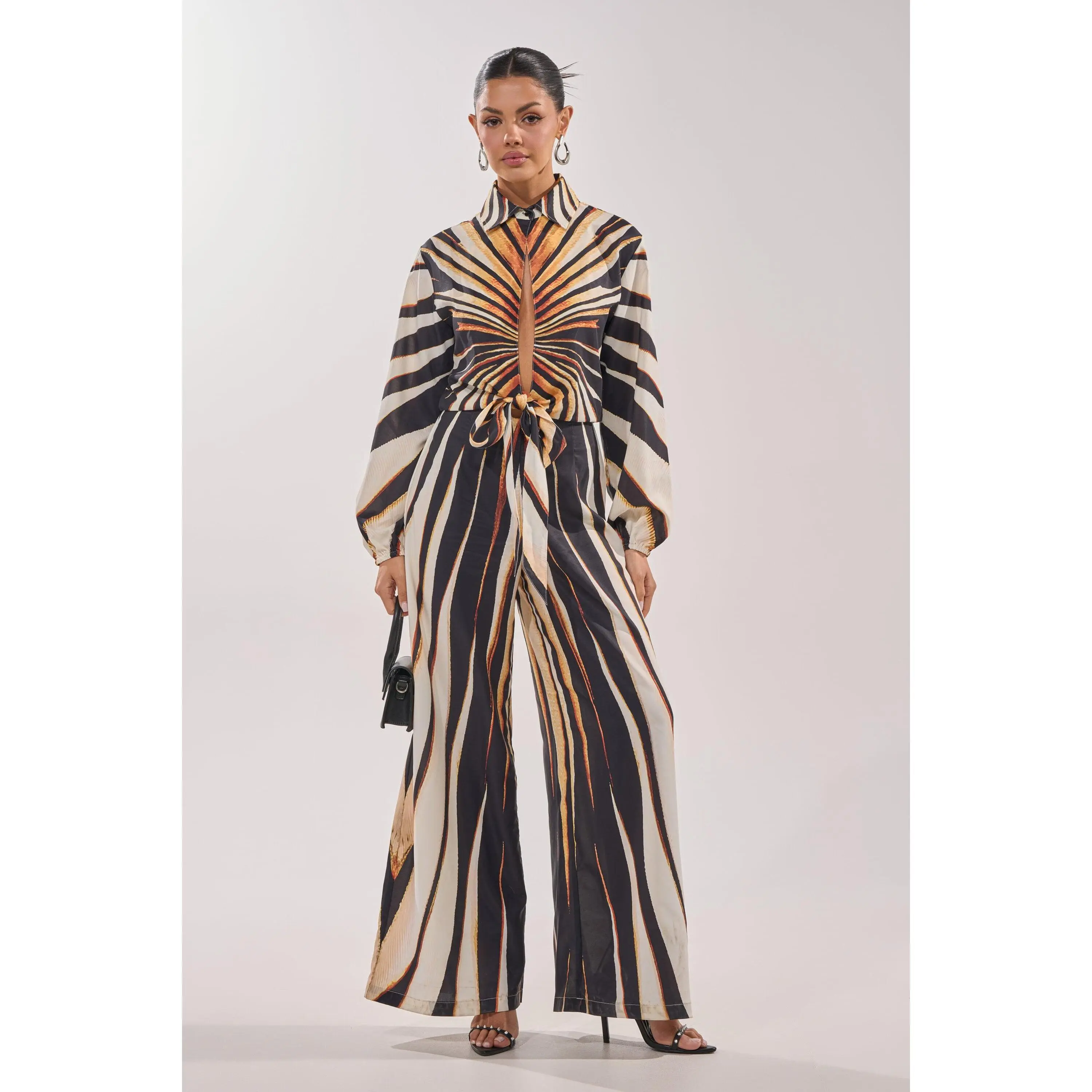 FIERCE INSTINCTS LONG SLEEVE JUMPSUIT