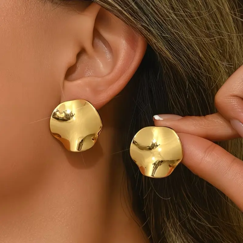 Aretes Redondos Planos de Acero Inoxidable Elegantes y Duraderos para Mujer