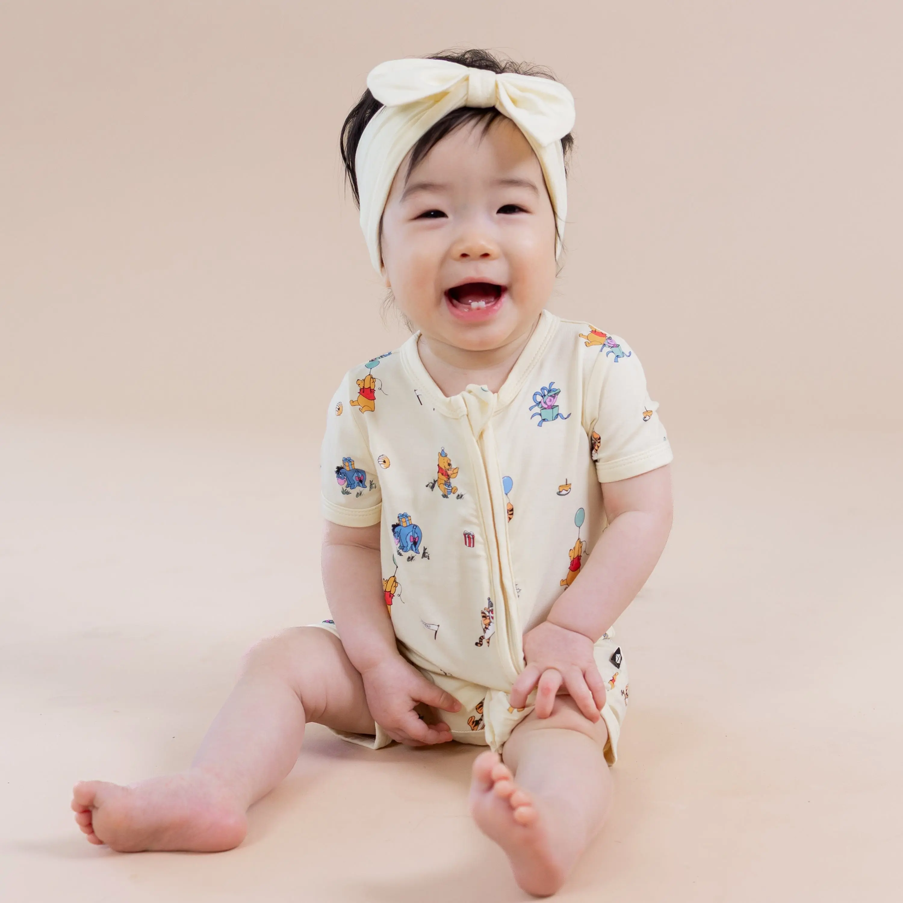 Zipper Shortall Romper in Winnie the Pooh Celebration Zipper Shortall Romper in Winnie the Pooh Celebration