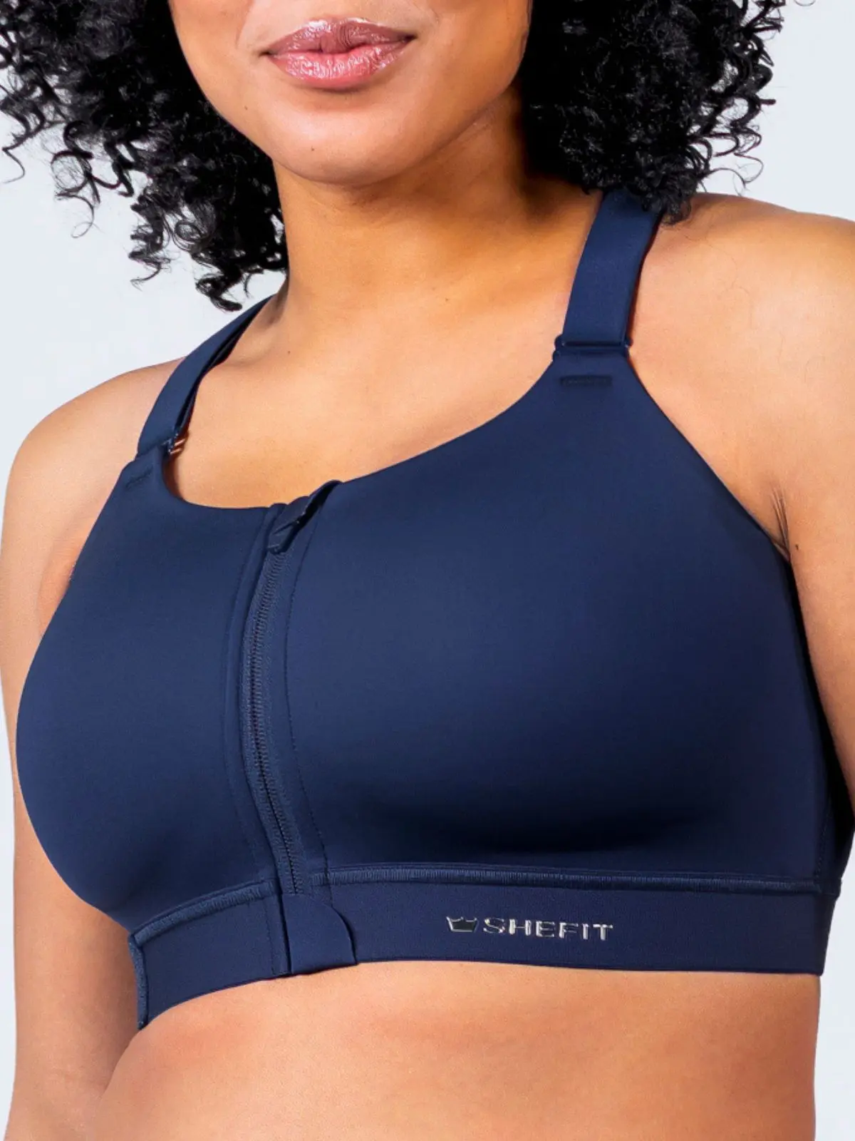 SHEFIT Emerge Women's Sports Bra, Solid Racerback with Patented Zip Cinch Lift, Adjustable Medium Support, Wire-Free Padded Seamless Cups, Gym Sports Bra, Solid Sports Bra