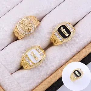 Men's 14k gold-plated wide band ring with CZ/oil droplet-shaped gemstone depicting Saint Jude, suitable for everyday wear and as a gift or for parties.