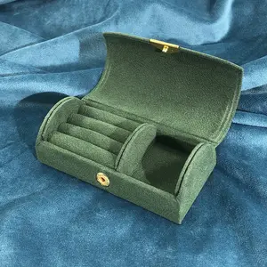 Green small jewelry box, mini travel jewelry storage box, portable travel jewelry organizer for women, suitable for storing rings and earrings.