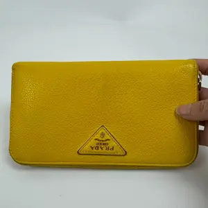 Pre-owned PRADA leather Clutches & Wristlets Yellow Long Wallet