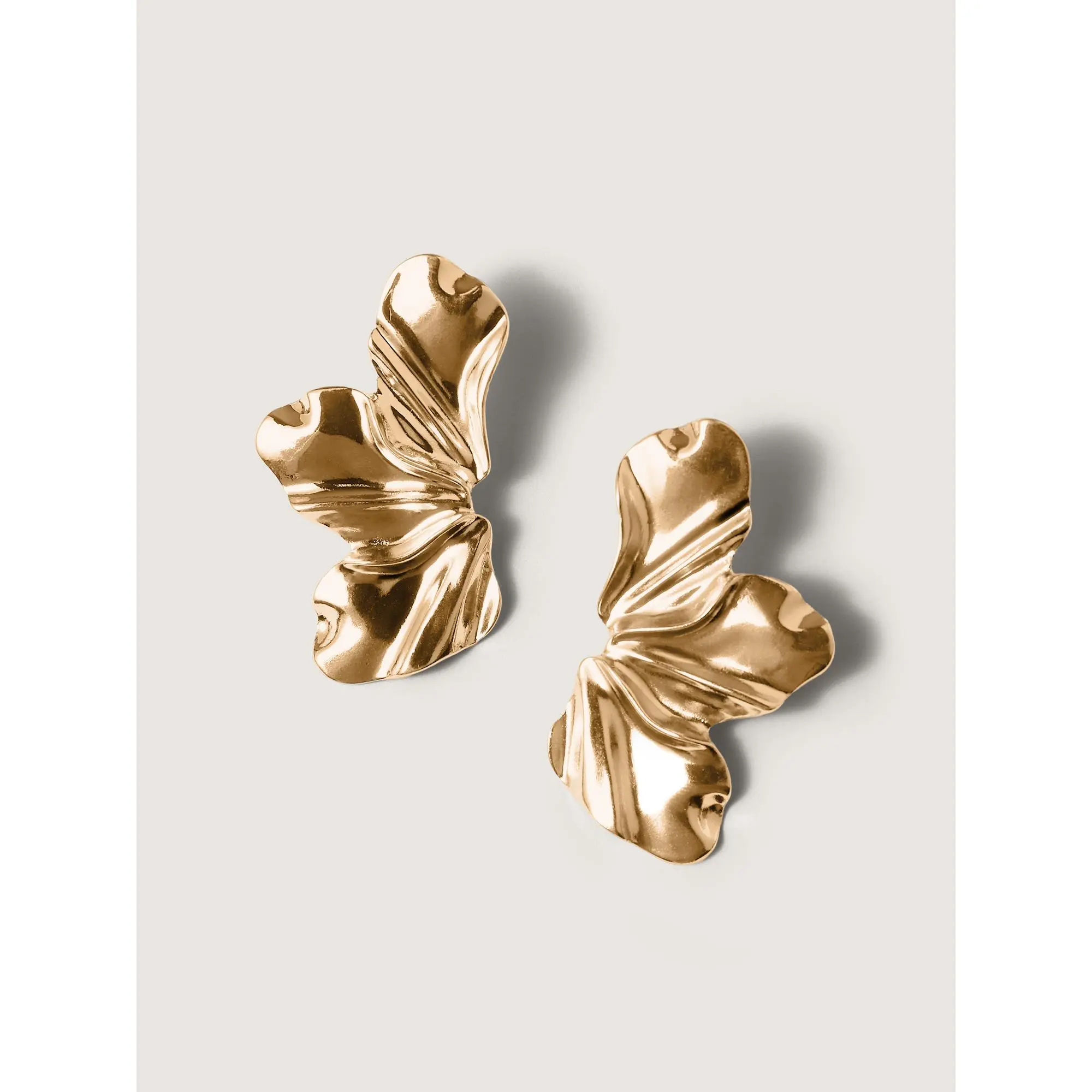 BloomChic Female Alloy Asymmetrical Pierced Earrings - Gold-Tone Floral Gold Charm, Stylish Jewelry for Summer Wear, Flowers, Irregular, 10% Stainless Steel, Jewelry For Women, Ear Stacking, Flower Cluster Earrings