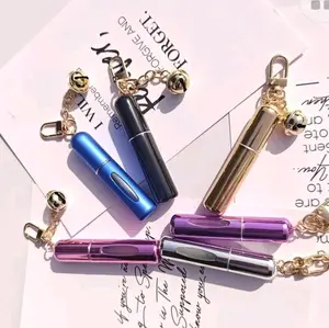 0.17oz Perfume Keychain Featuring a Delicate Pearl And a Sleek Metal Vial