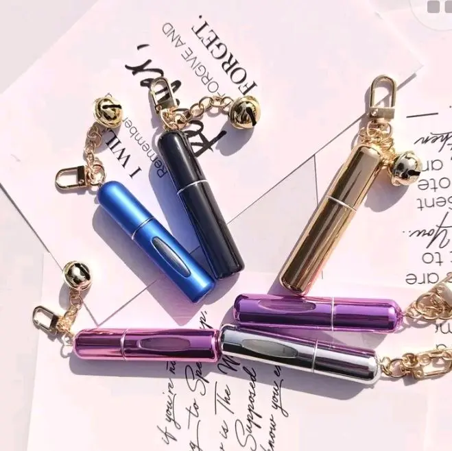 0.17oz Perfume Keychain Featuring a Delicate Pearl And a Sleek Metal Vial