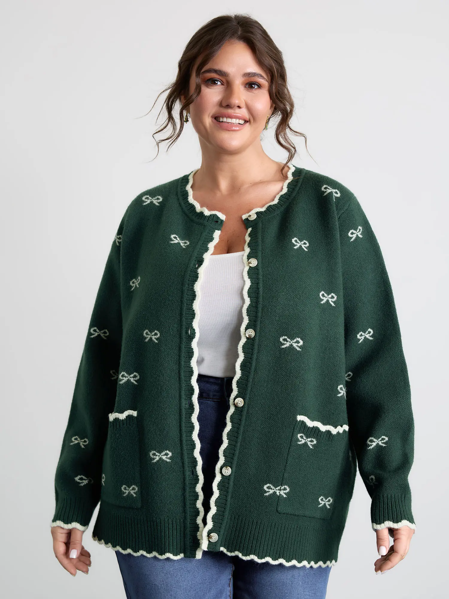 BloomChic Women's Playful Christmas Knit Cardigan - Oversized Drop Shoulder Long Sleeve Top with Jacquard Bows, Peter Pan Collar, Buttons, Medium Length, Playful Look, Acrylic Blend Fabric (Nylon, Polyester) - Low Iron, Flat Fit