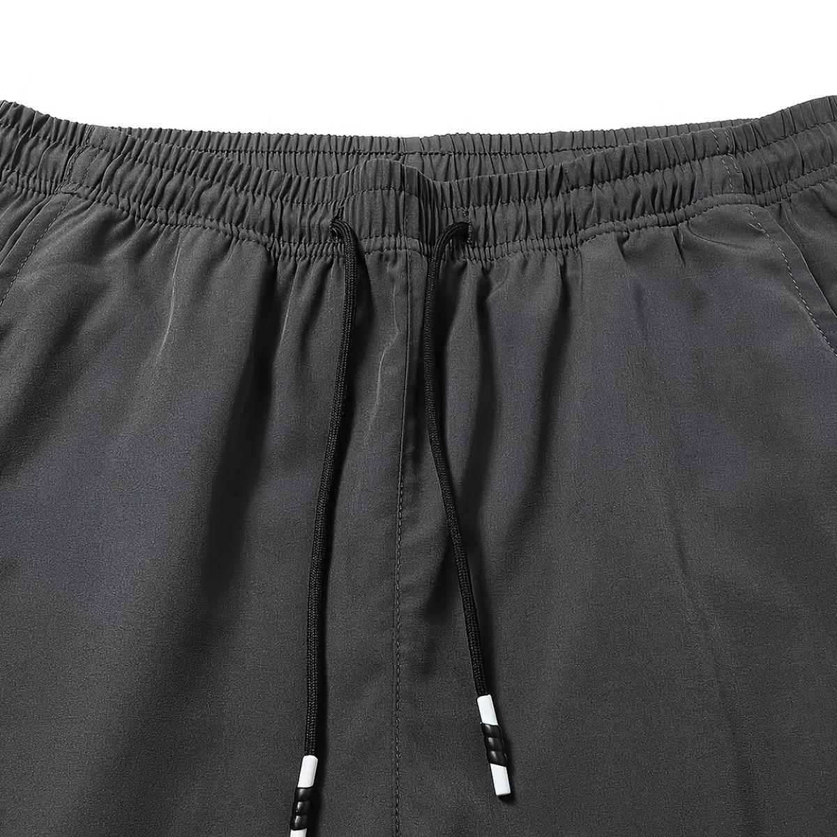 Men's 3-pack slim fit straight leg casual pants, polyester spandex blend, featuring an elastic waistband with drawstring, mid-rise, side pockets, suitable for outdoor activities and everyday wear SpringStatements