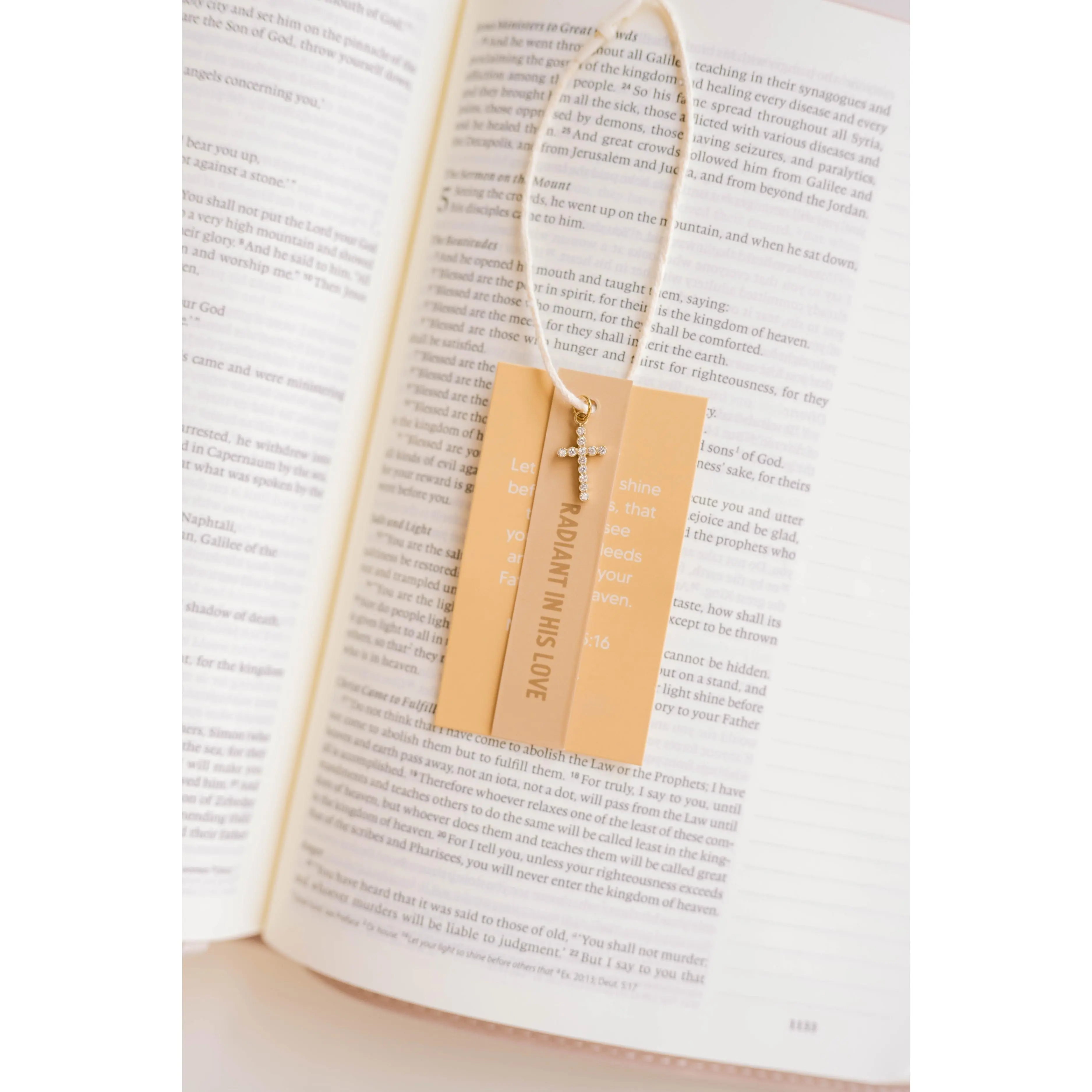 Radiant Cross Charm