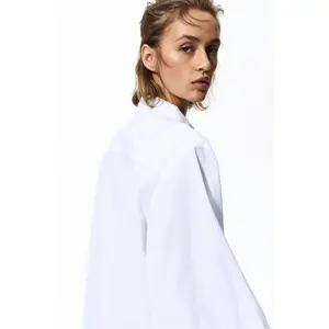 H&M Lace-trimmed cotton shirt