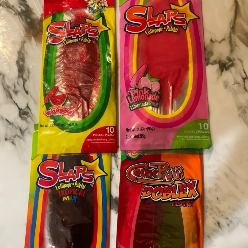 Slaps lollipops tropical mix , pink lemonade , doblex , watermelon