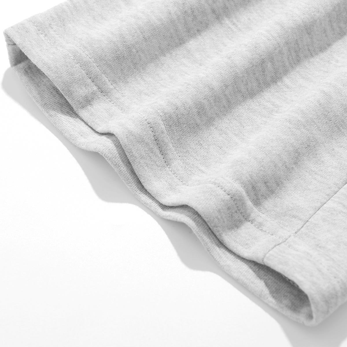 Men's loose-fit sweatpants, featuring a casual drawstring elastic waistband, wide legs, and jogger pockets. Comfortable for everyday wear and athletic bottoms.