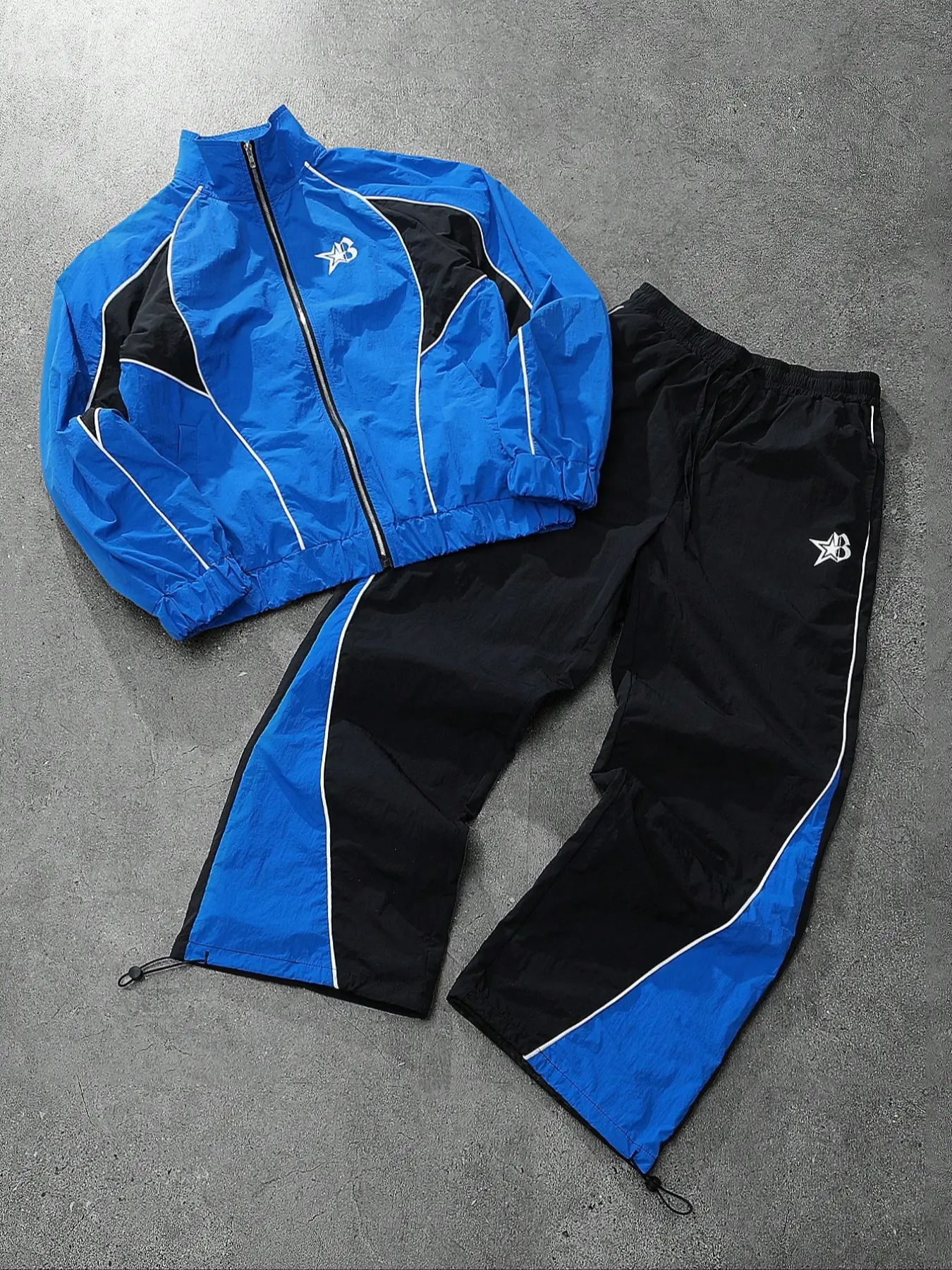 This men's two-piece Athletic, Training Tracksuit Set includes a turtleneck jacket and sweatpants, featuring a blue and black color-block design, suitable for outdoor activities and casual wear, it also makes a great holiday gift, Sport Casual Outfit