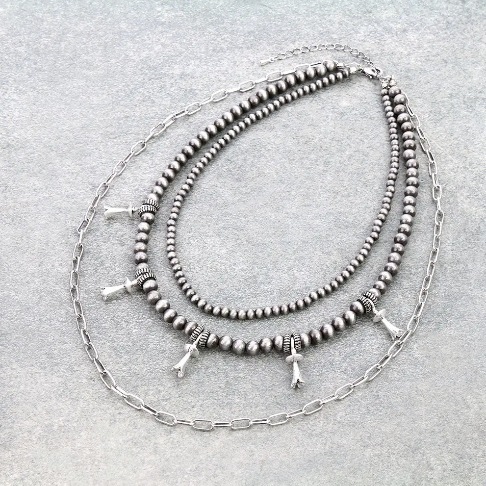 3 layered single sqaush blossom necklace