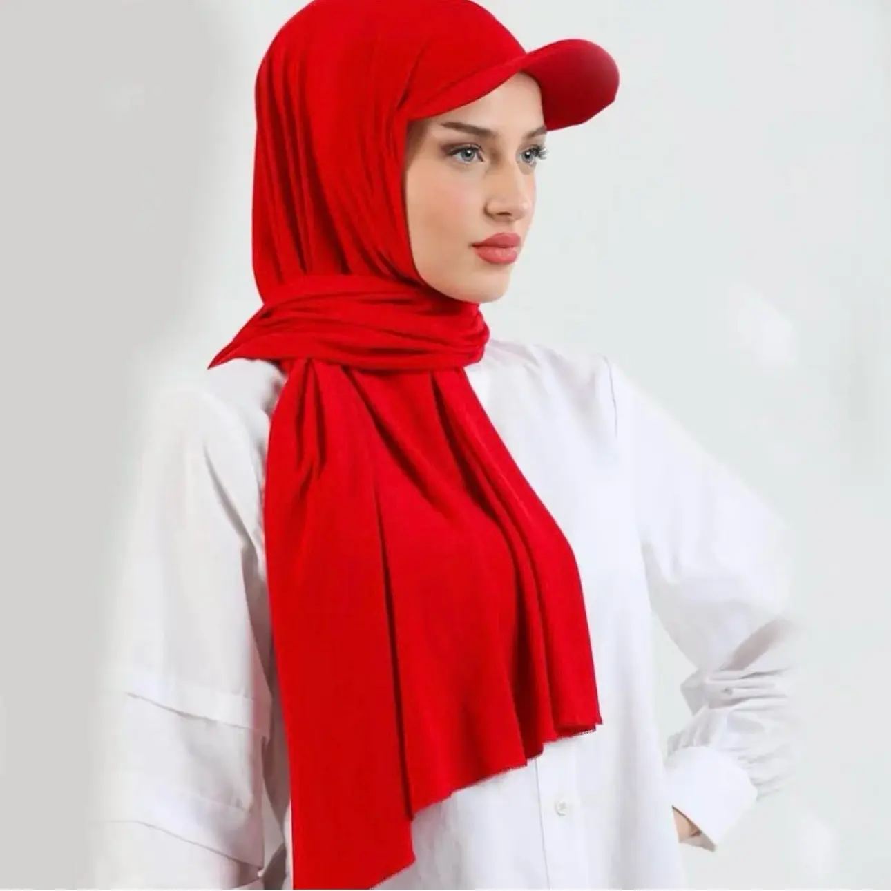 Jersey Hijab with baseball cap.