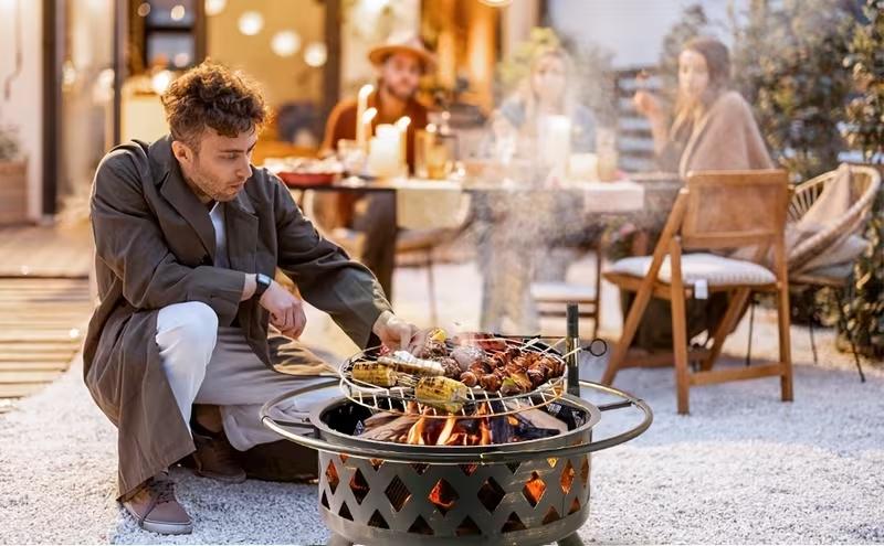 Aoxun 2 in 1 Fire Pit with Grill 30'' Wood Burning Outdoor Fire Pits Outside with Metal BBQ Grill Spark Screen Poker for Patio Backyard Garden 360° Adjustable Grill Airflow Design - Exterior Aoxun 2 in 1 Fire Pit with Grill 30'' Wood Burning Outdoor Fire Pits Outside with Metal BBQ Grill Spark Screen Poker for Patio Backyard Garden 360° Adjustable Grill Airflow Design - Exterior