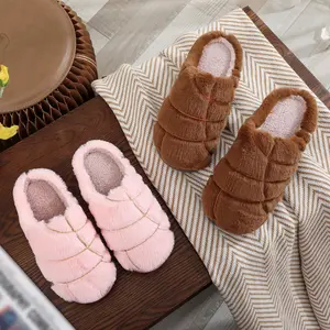 Cute couple-matching Christmas-themed cotton slippers, suitable for both men and women, featuring non-slip soles and warm plush lining for autumn and winter.  In stock and ready to ship.