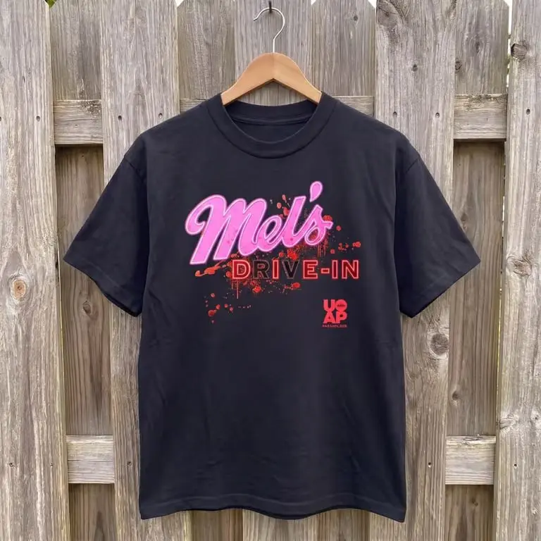 Mels Die In Universal Studios Halloween Horror Nights T-Shirt, Short Sleeve Crew Neck T-Shirt, Pull On, Casual