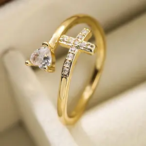 14k gold-plated ring decorated with a cross and Cubic Zirconia stones, suitable for everyday wear, as a gift, or for parties.