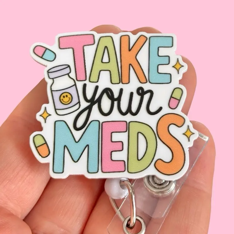 Glitter My Badge Take your meds funny badge reel for nurse and hospital workers. Badge clip Badge pull - Retractable swivel clip with a 360 rotation. Great gift for coworker