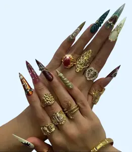 Aura Nails - Luxury custom nails - free style - long nails - chrome nails - trendy nails - Catholic nails - religious nails - mix nails - renaissance nail -  gold charms