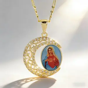 A Pendant Necklace of The with a Moon Design, Featuring a Decorative Golden Chain. This Elegant And s  Unique Religious Symbol That Complements Casual Outfits.