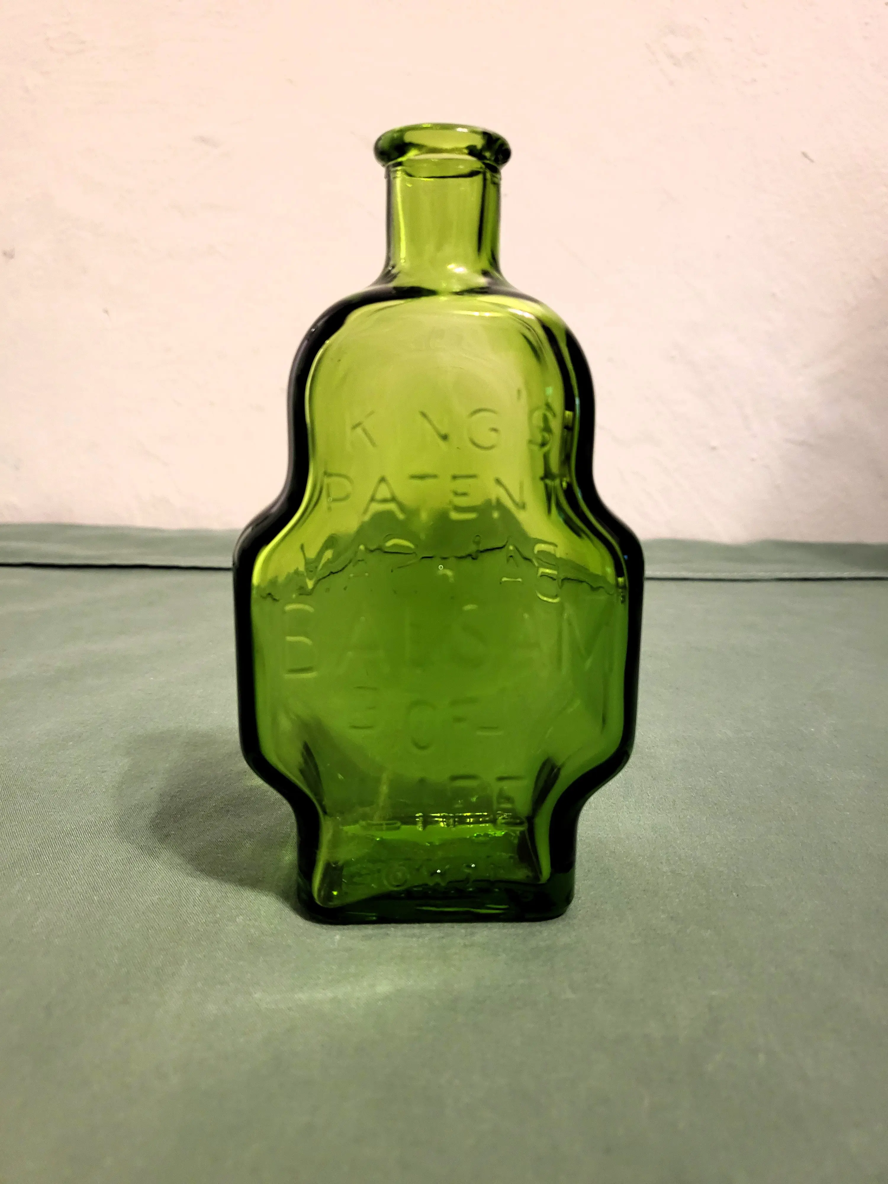 Antique Green Glass Medicine Bottle - Embossed with Balsam, Unique Shaped Basan/King’s Patent Balsam of Life, Decorative Apothecary-Style Farmhouse Storage Jar, Home Supplies Organizer for Themed Decor, Unique Shaped Bottle