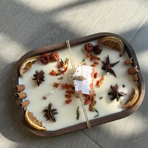 Handmade wooden bowl-shaped soy wax candle, purely handcrafted. lavender-based with spicy notes. A cozy decorative bowl to give as a gift to friends and family.