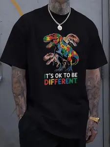 Men's Black Graphic T-Shirt with Colorful Dinosaur Print & "It's OK to Be Different" Slogan - 100% Cotton Casual Short Sleeve Tee, Regular Fit Round Neck Summer Top for Casual Attire, Dinosaur Shirt, Machine Washable Clothing, Bold Geometric Design