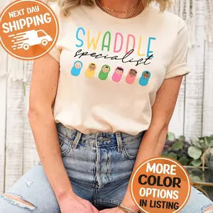 Swaddle Specialist Labor And Delivery Shirt, NICU Nurse Shirt, Mother Baby Unit Sweatshirt, Postpartum Nurse Shirt, Nursery Nurse Tee K