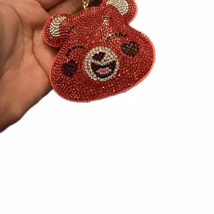 Red happy bear bag charm