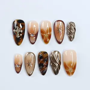 Fall Press on Nails With Tortoise Shell and Gold 3D Accents, Medium Almond Brown and Nude Nails With Starburst and Textured Chrome Design