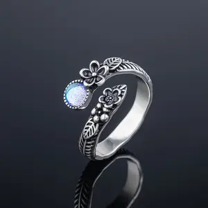 Nature's Whisper Moonstone Ring – Adjustable Floral Silver Band