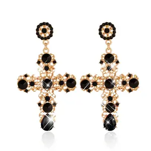 Elegant boho cross design for women, featuring rhinestone dangle drop earrings and rhinestone stud earrings.