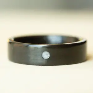 Mother of Pearl Sun on Carbon Fiber