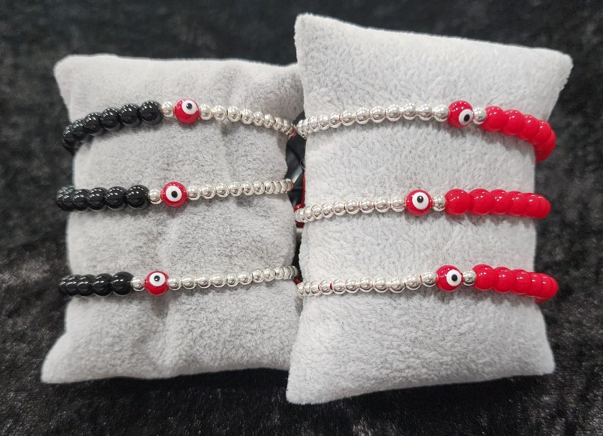 Pulsera ojo rojo y negro.Red and black eye bracelet.
