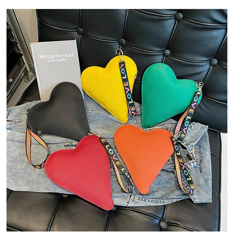 Dopamine colored heart bag! A niche design heart-shaped crossbody bag is a must-have for sweet girls with a concave shape when going out on the street
