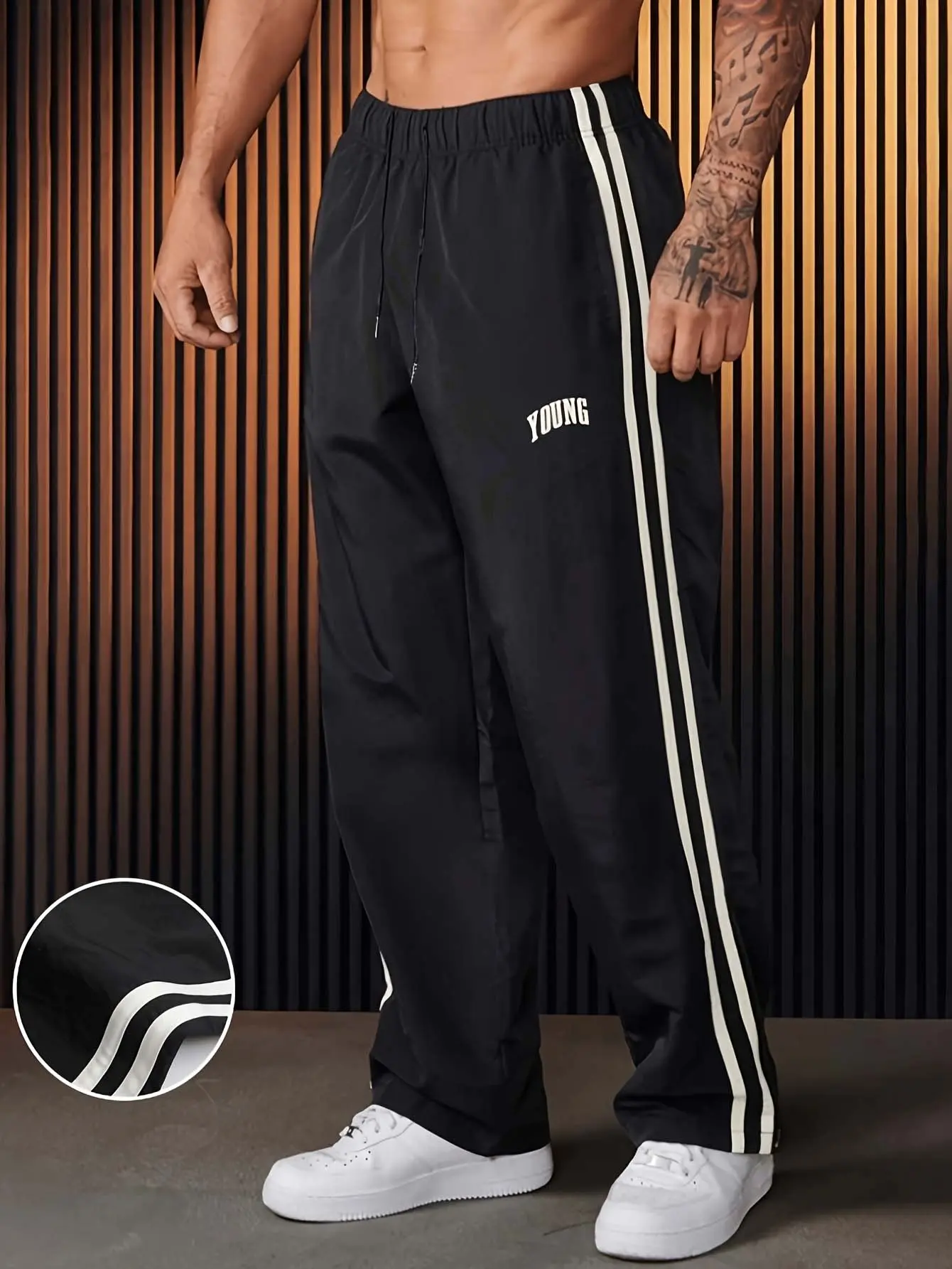 Men’s straight-leg athletic pants with side stripes – wide-leg casual joggers featuring a drawstring elastic waistband and letter print, suitable for jogging, workouts, daily commuting, and streetwear looks when out and about.